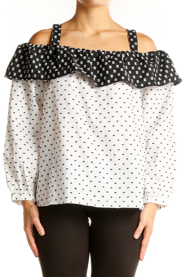 Front view of LOFT white off-shoulder top with black polka dots and contrast ruffle neckline