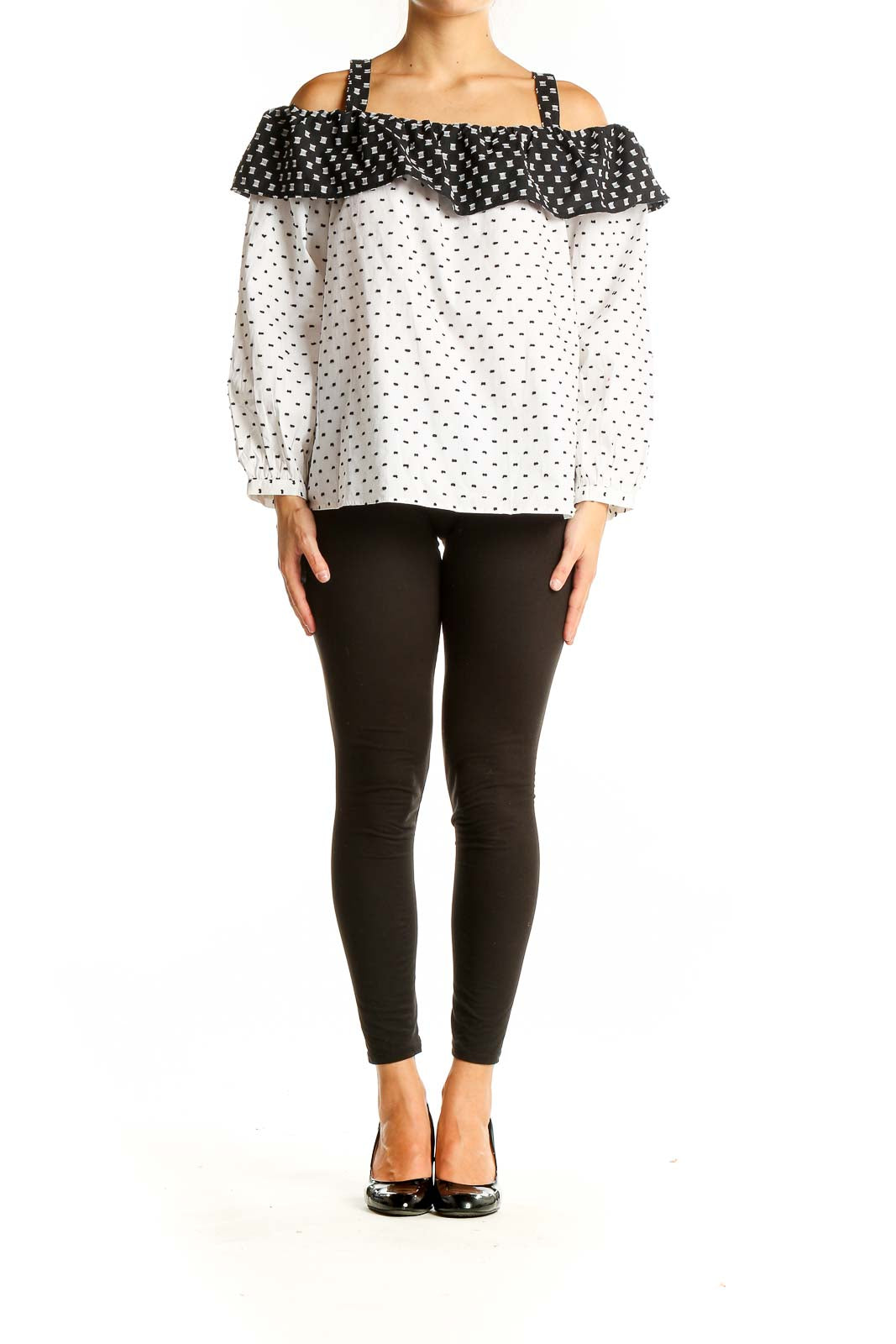 Front view of LOFT white off-shoulder top with black polka dots and contrast ruffle neckline