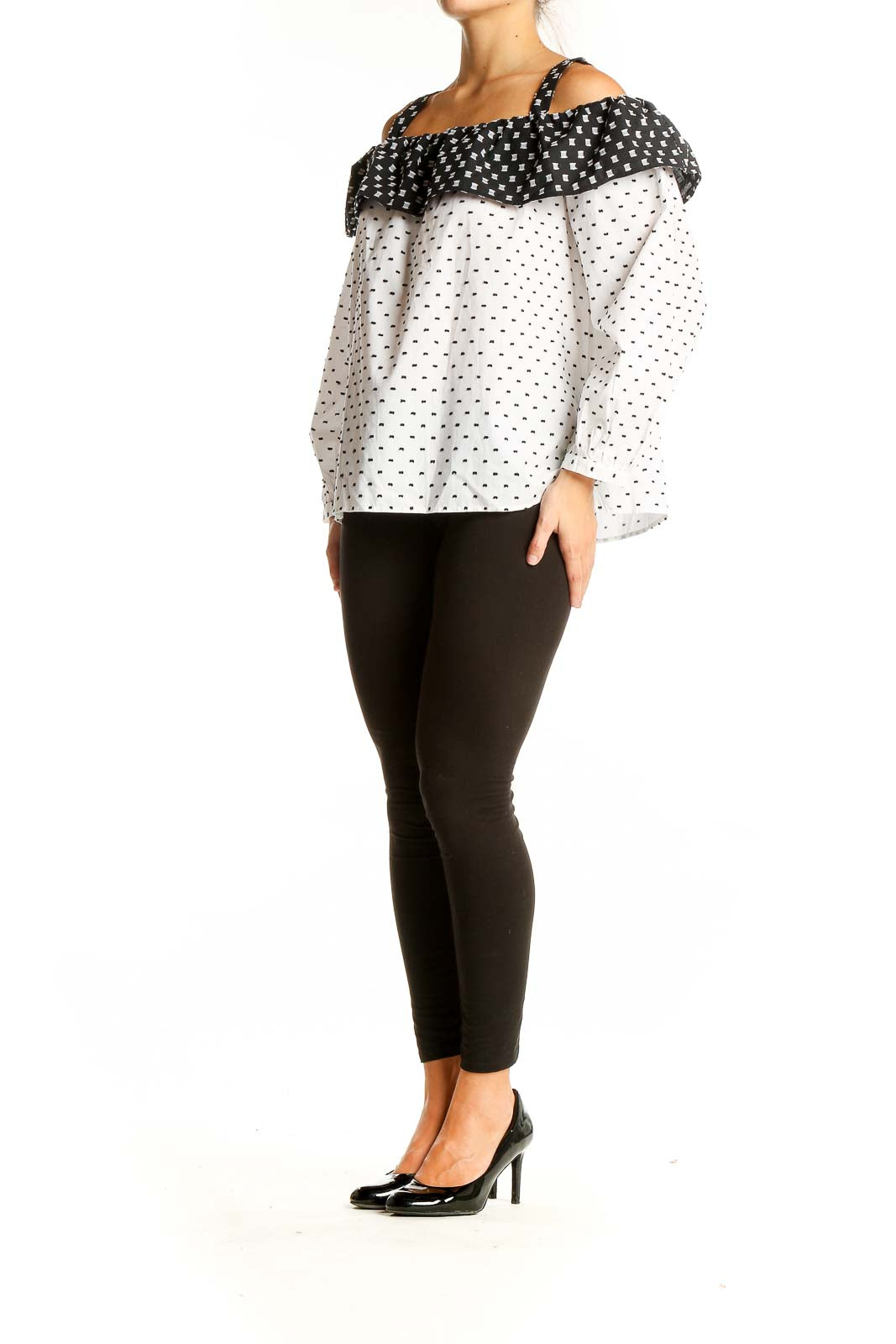 Front view of LOFT white off-shoulder top with black polka dots and contrast ruffle neckline