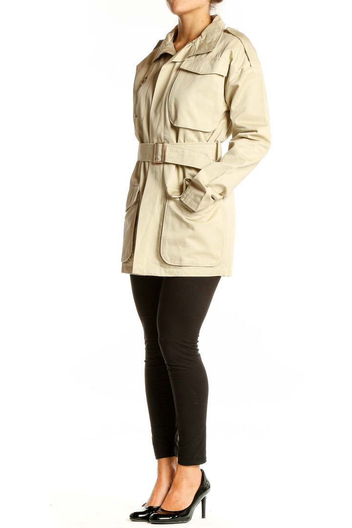 Front view of Naked Wardrobe beige utility coat with belt and pockets