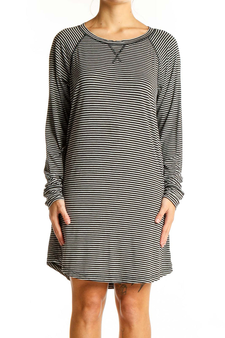 Front view of J.Crew black and white striped long sleeve dress