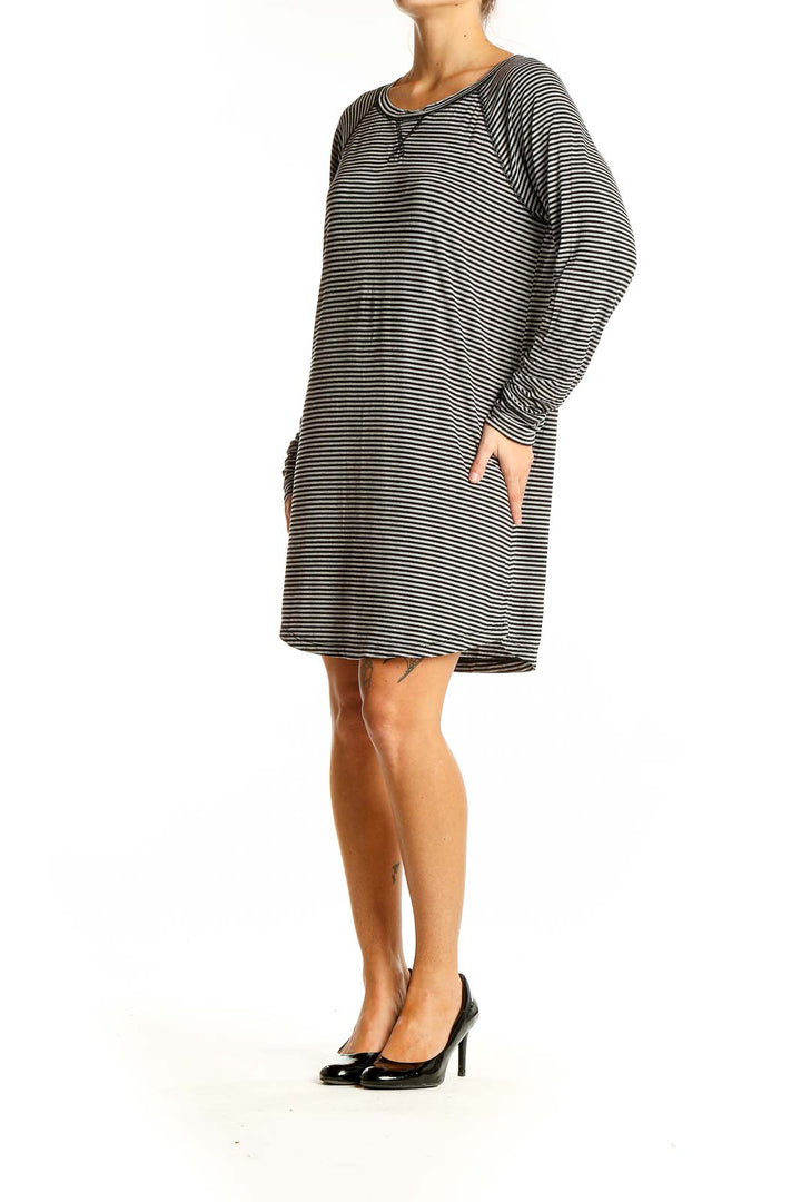 Front view of J.Crew black and white striped long sleeve dress