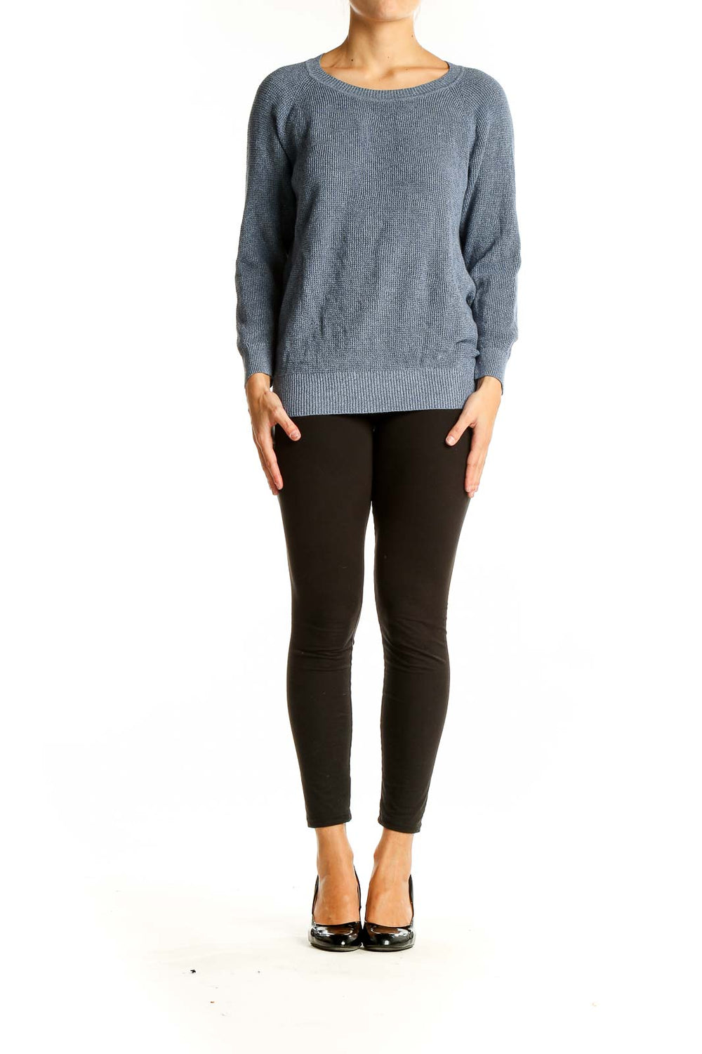 Front view of Madewell blue cotton knit sweater on model