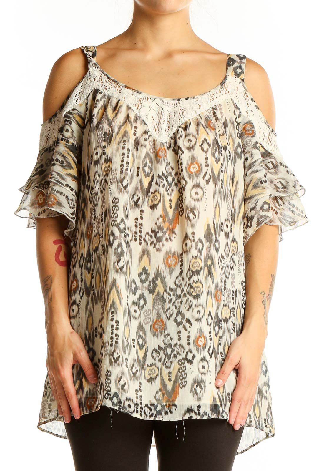 Front view of Daniel Rainn beige ikat print cold shoulder blouse with lace trim