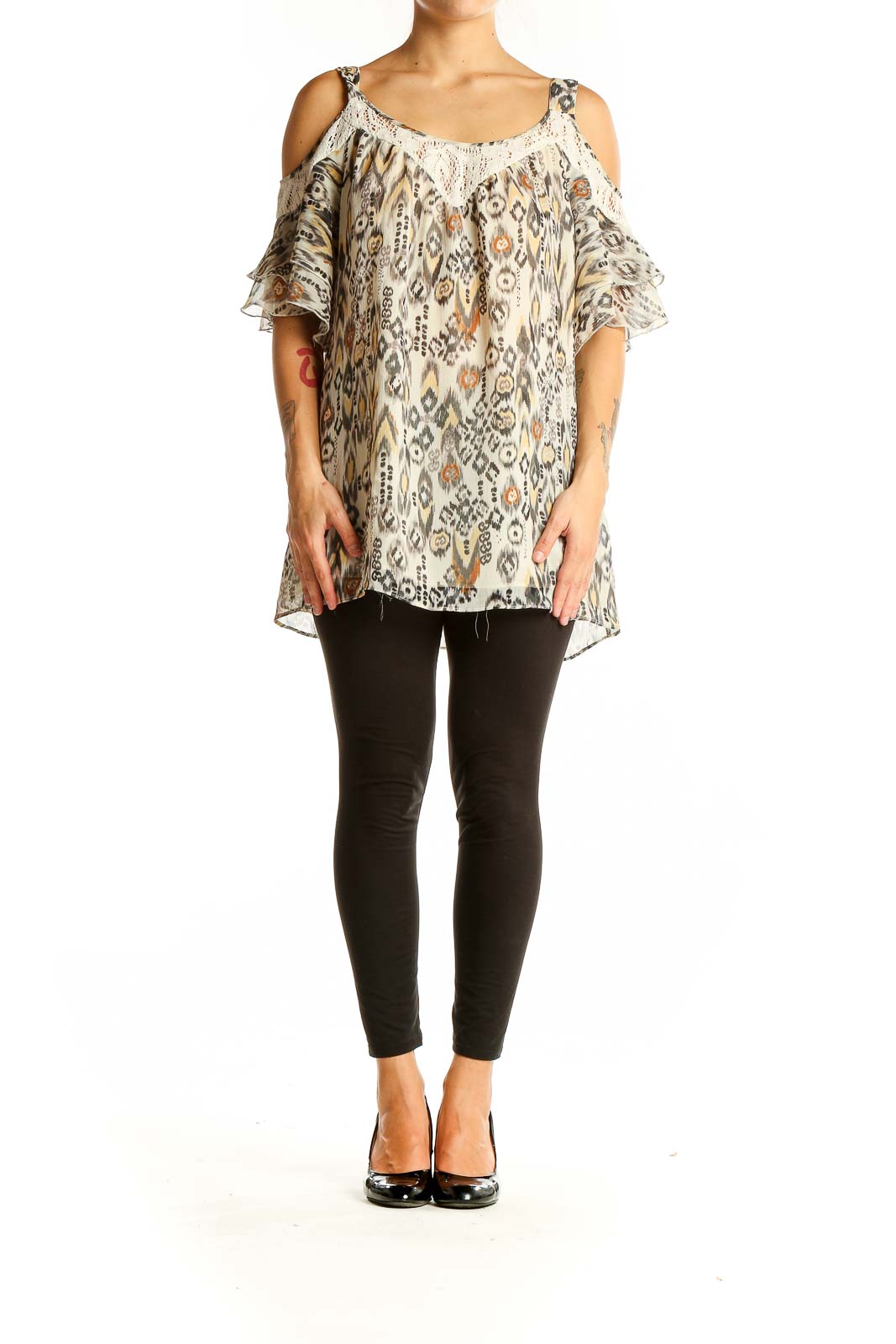 Front view of Daniel Rainn beige ikat print cold shoulder blouse with lace trim