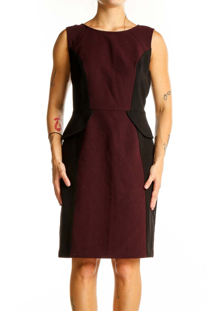 Front view of LOFT burgundy and black color block sheath dress