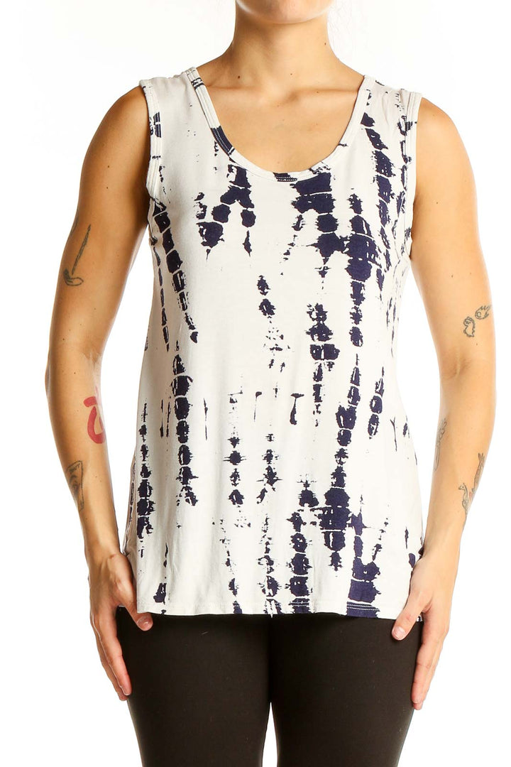 Front view of white and navy tie-dye tank top with vertical pattern