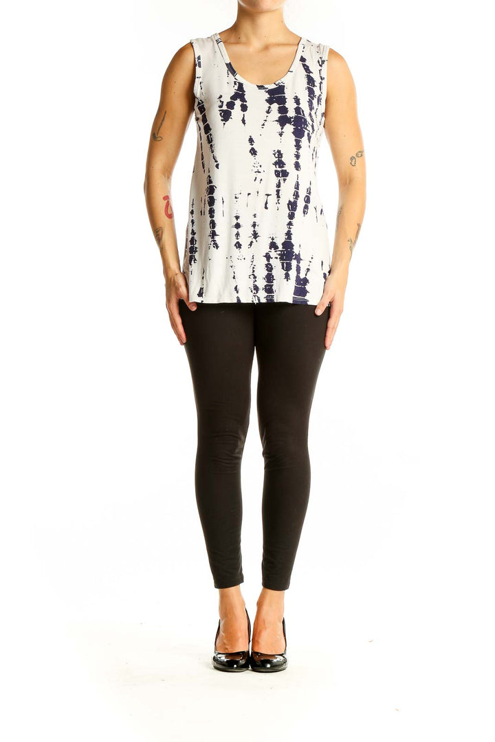 Front view of white and navy tie-dye tank top with vertical pattern