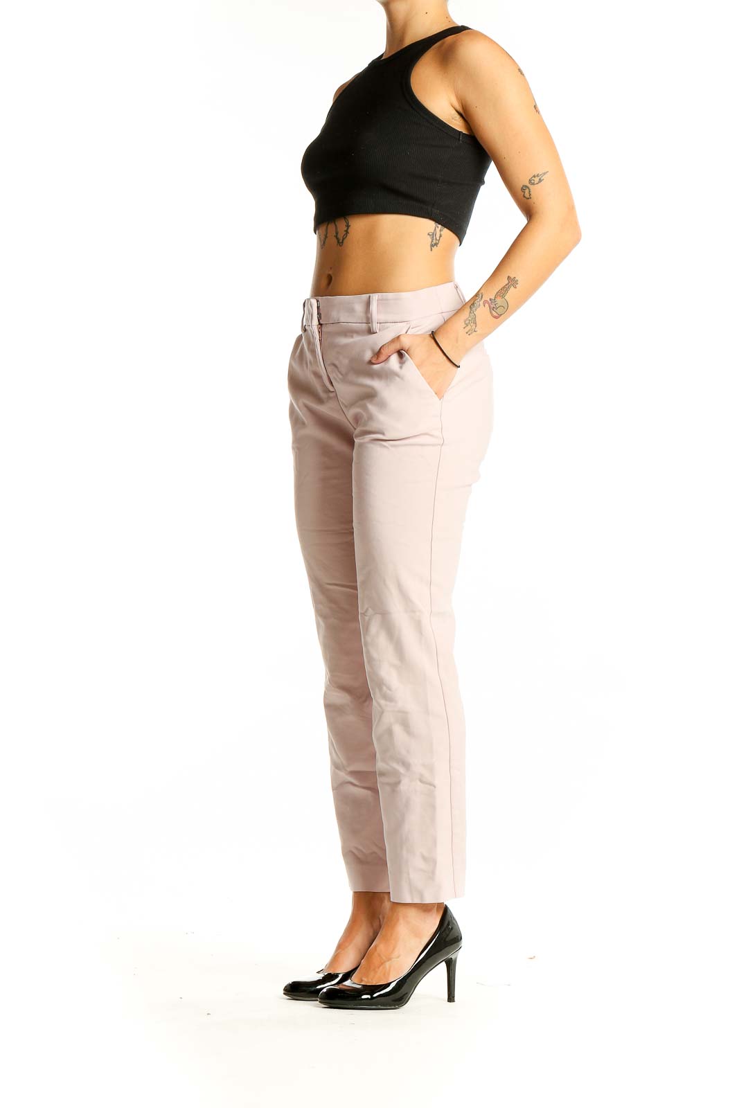 Front view of Express blush slim fit ankle pants on model