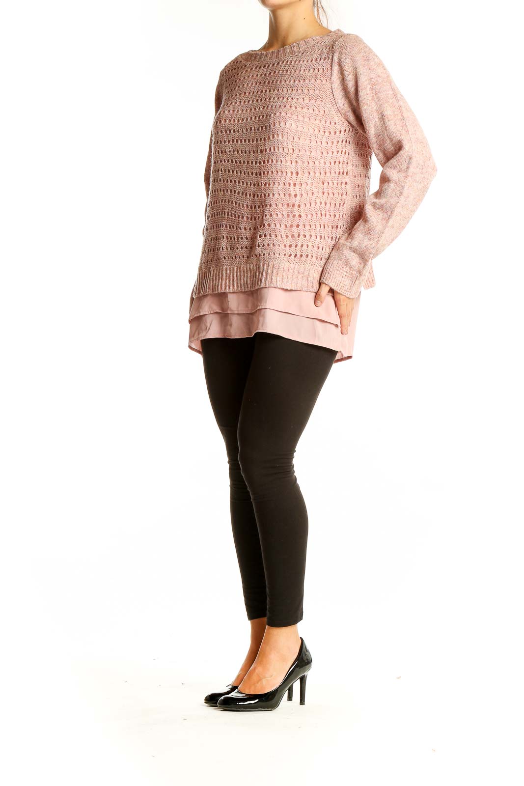 Front view of pink layered knit sweater with open-knit design