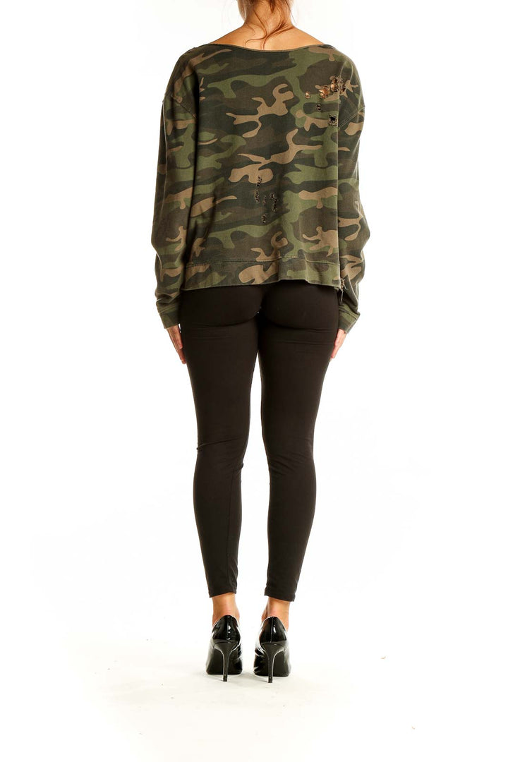 Back view of green camouflage distressed cotton sweatshirt showing overall pattern