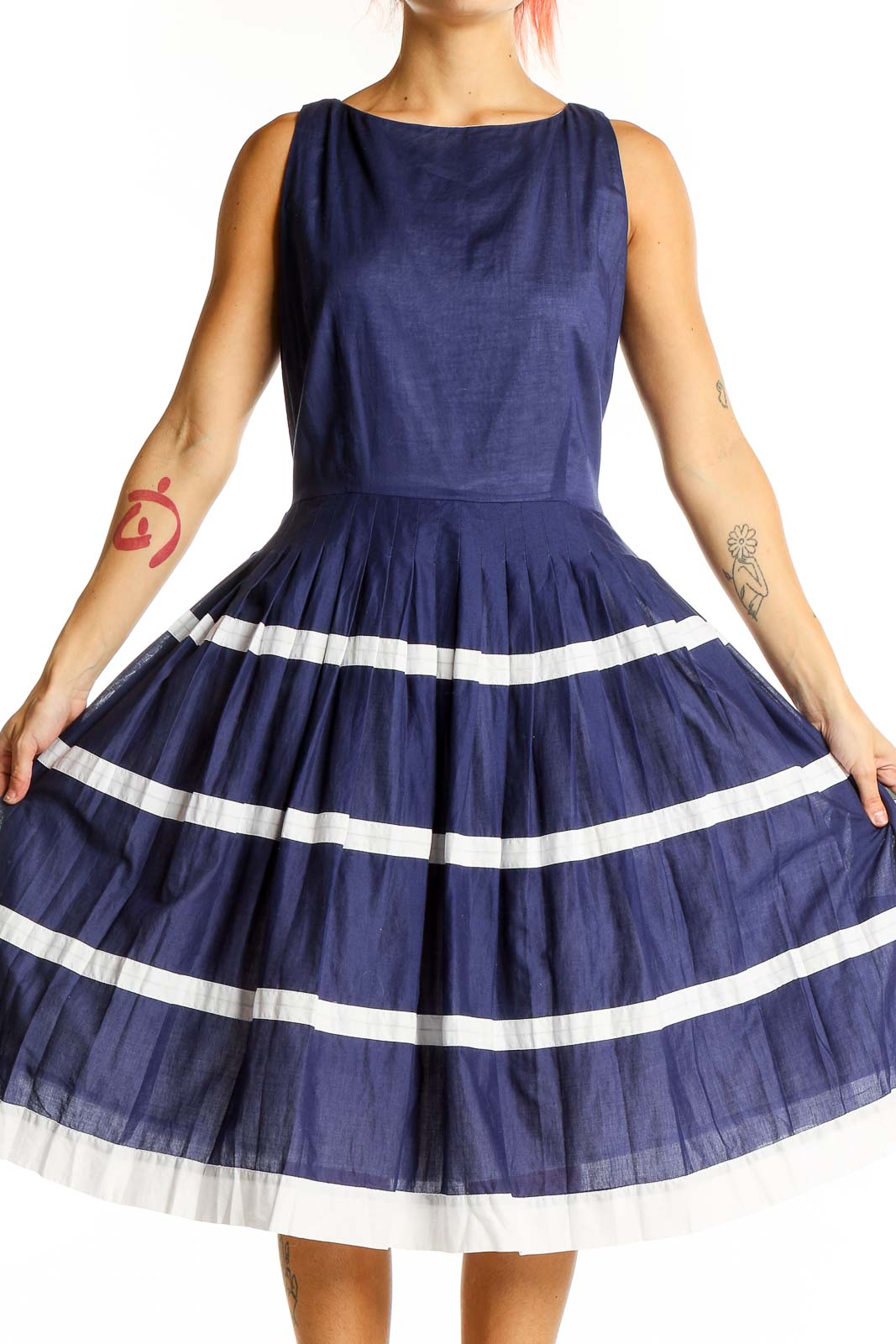 Front view of navy Talbots cotton dress with white striped pleated skirt