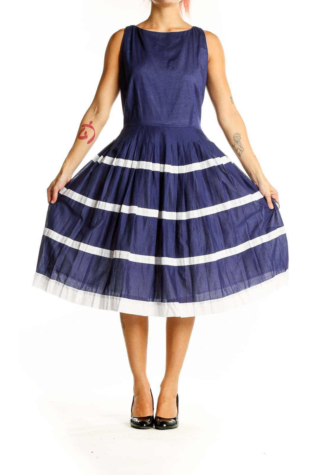 Front view of navy Talbots cotton dress with white striped pleated skirt