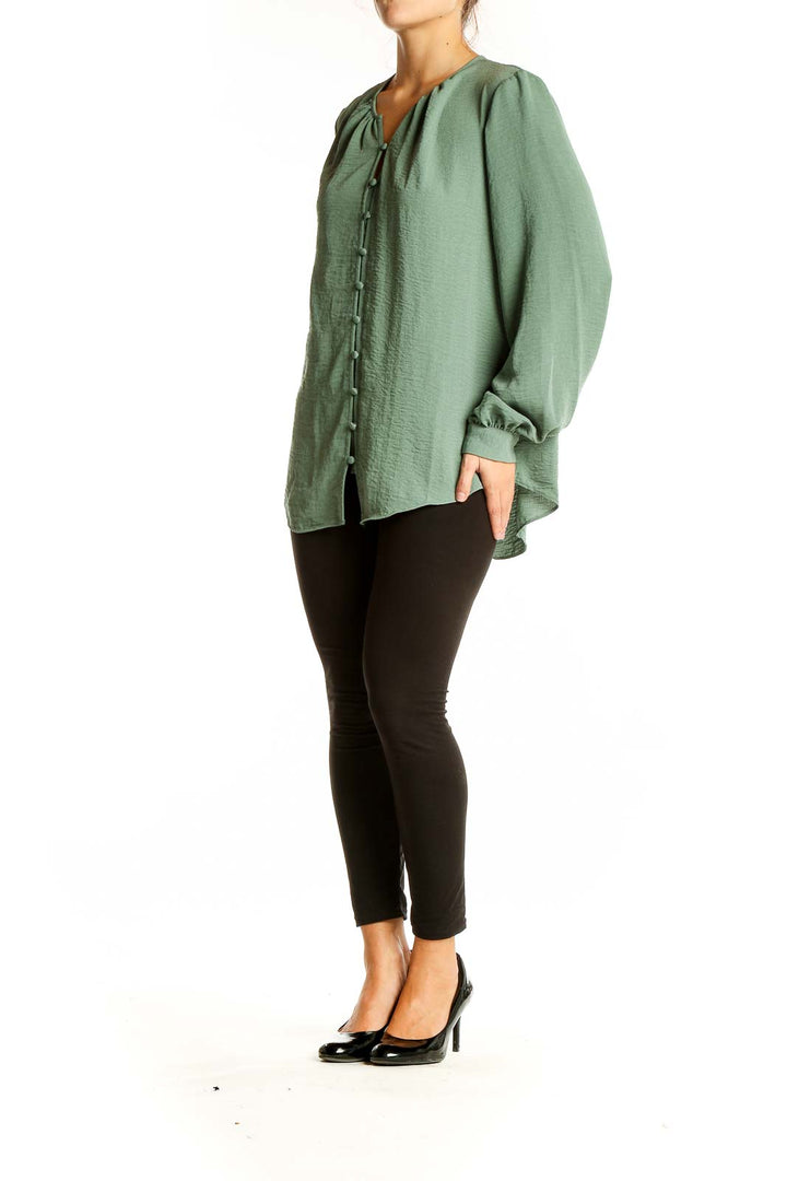 Front view of Nine West sage green button-front blouse with balloon sleeves