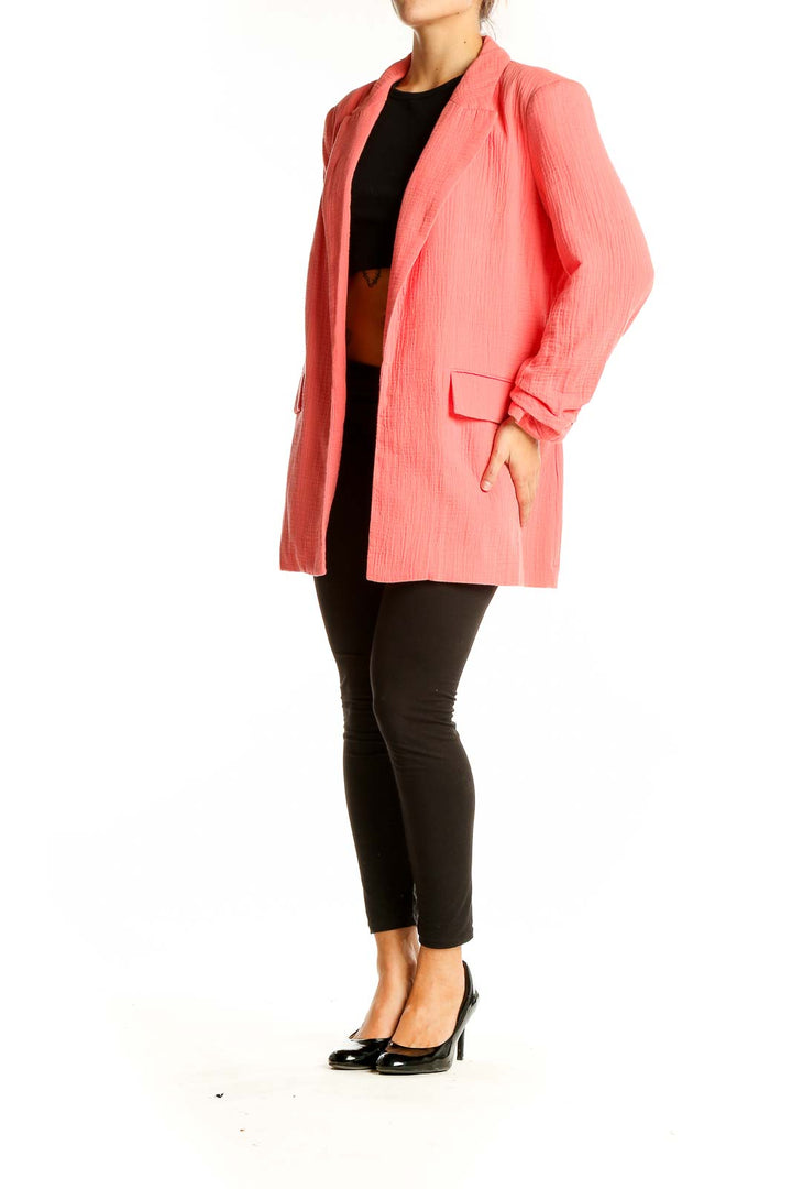 Front view of Nine West coral textured oversized blazer