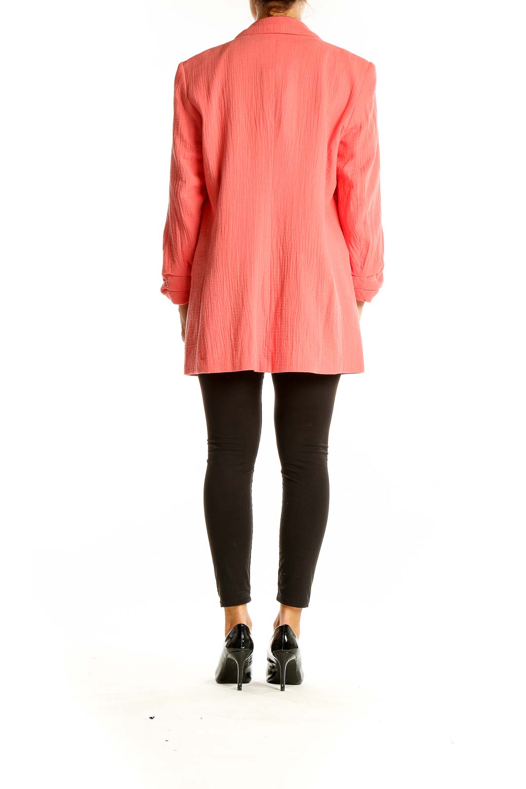 Back view of Nine West coral textured oversized blazer on model