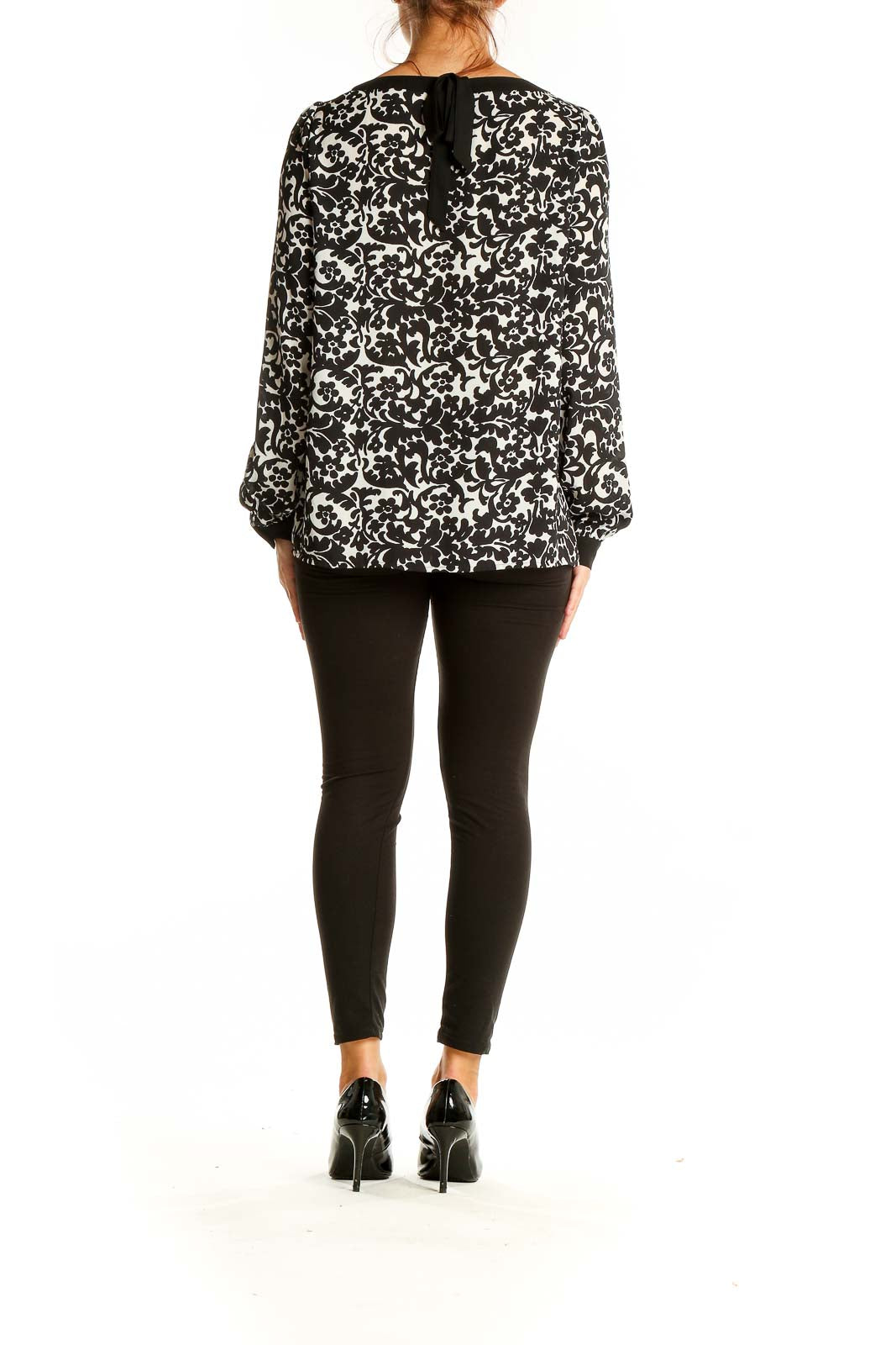 Back view of Ann Taylor LOFT black and white floral print blouse showing full length