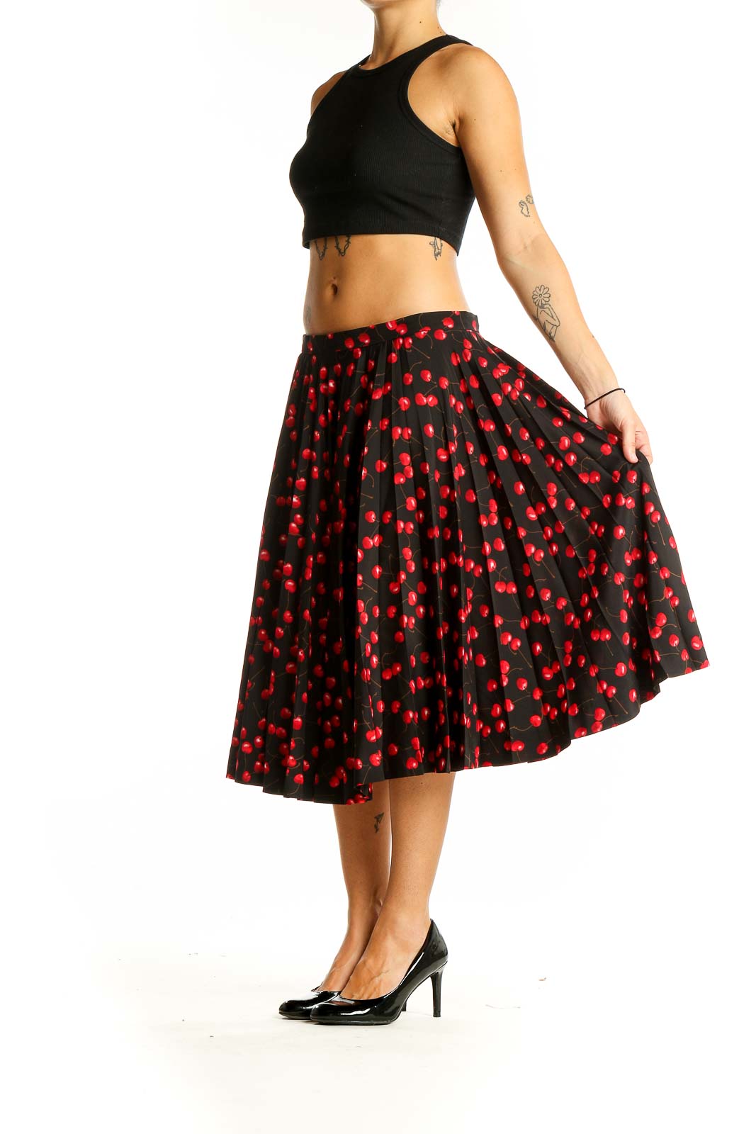 Front view of J.Crew black midi skirt with red cherry print