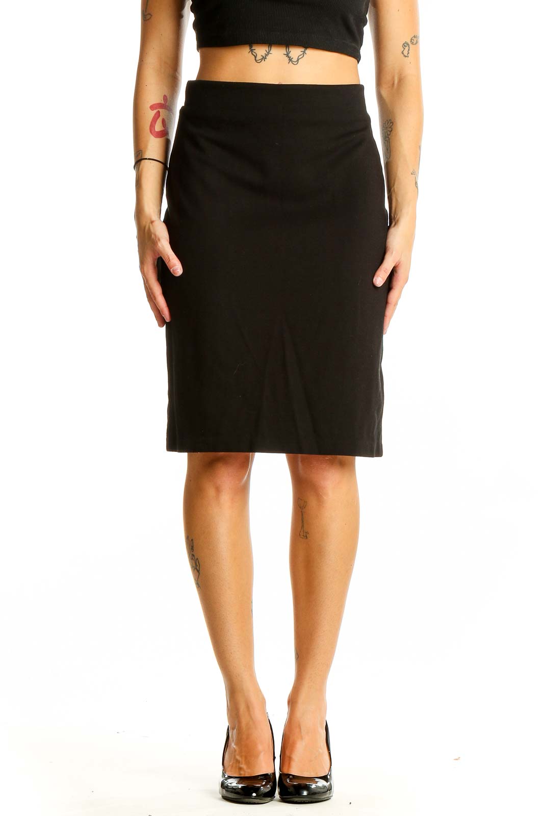 Front view of black Philosophy pencil skirt on model