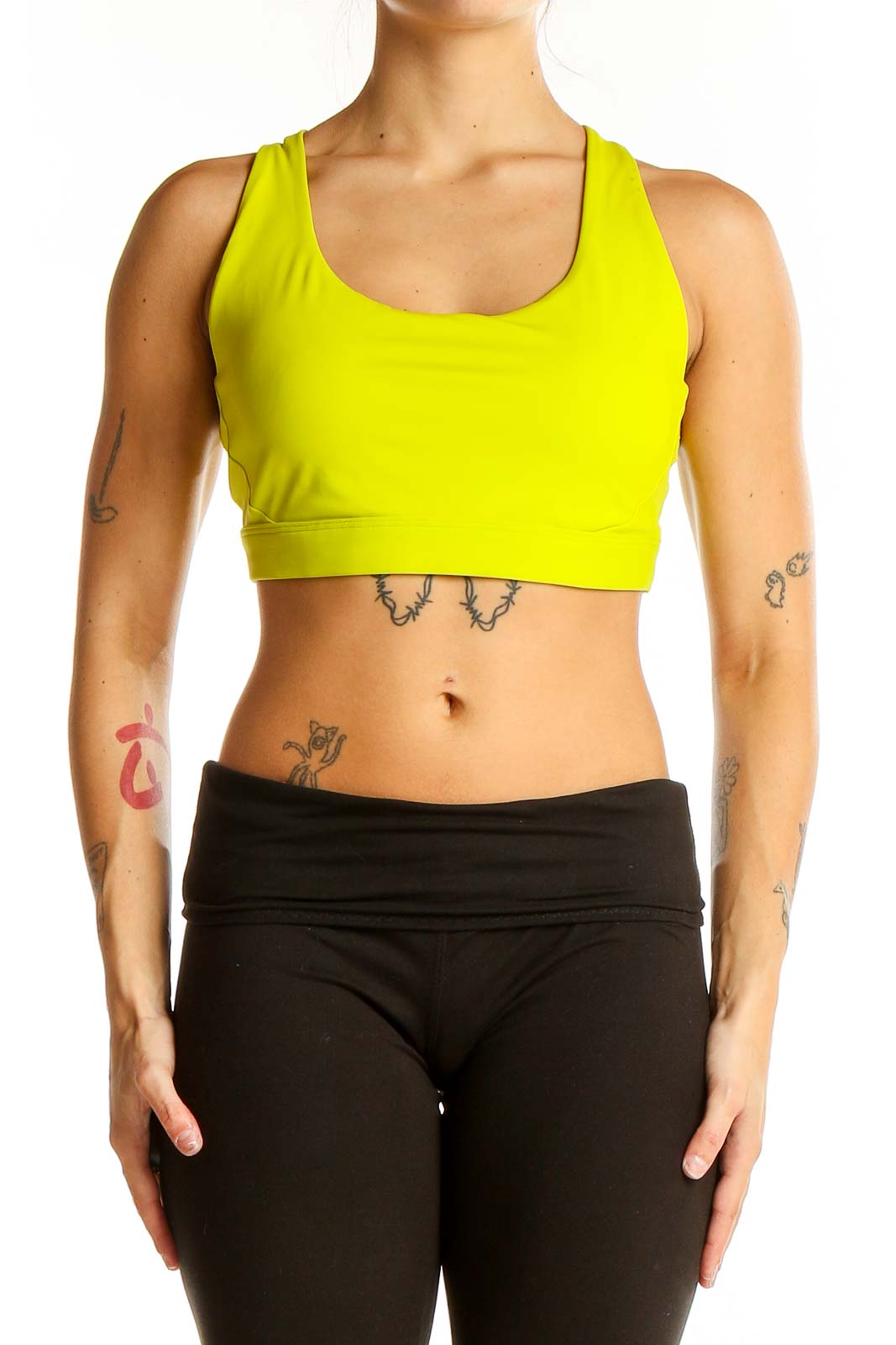 Front view of neon yellow Athleta racerback sports bra