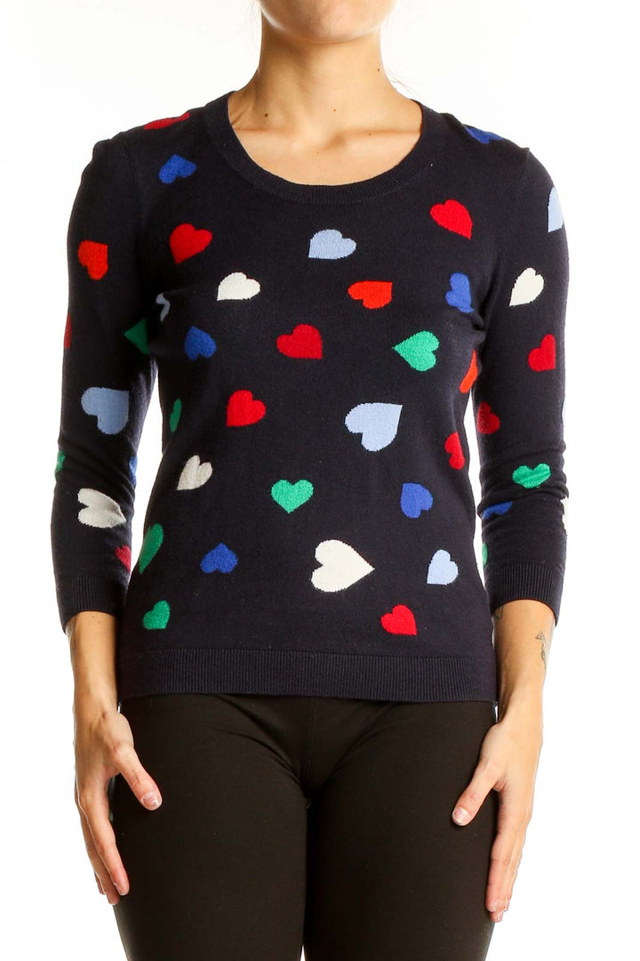 Front view of Talbots black knit sweater with multi-color heart print