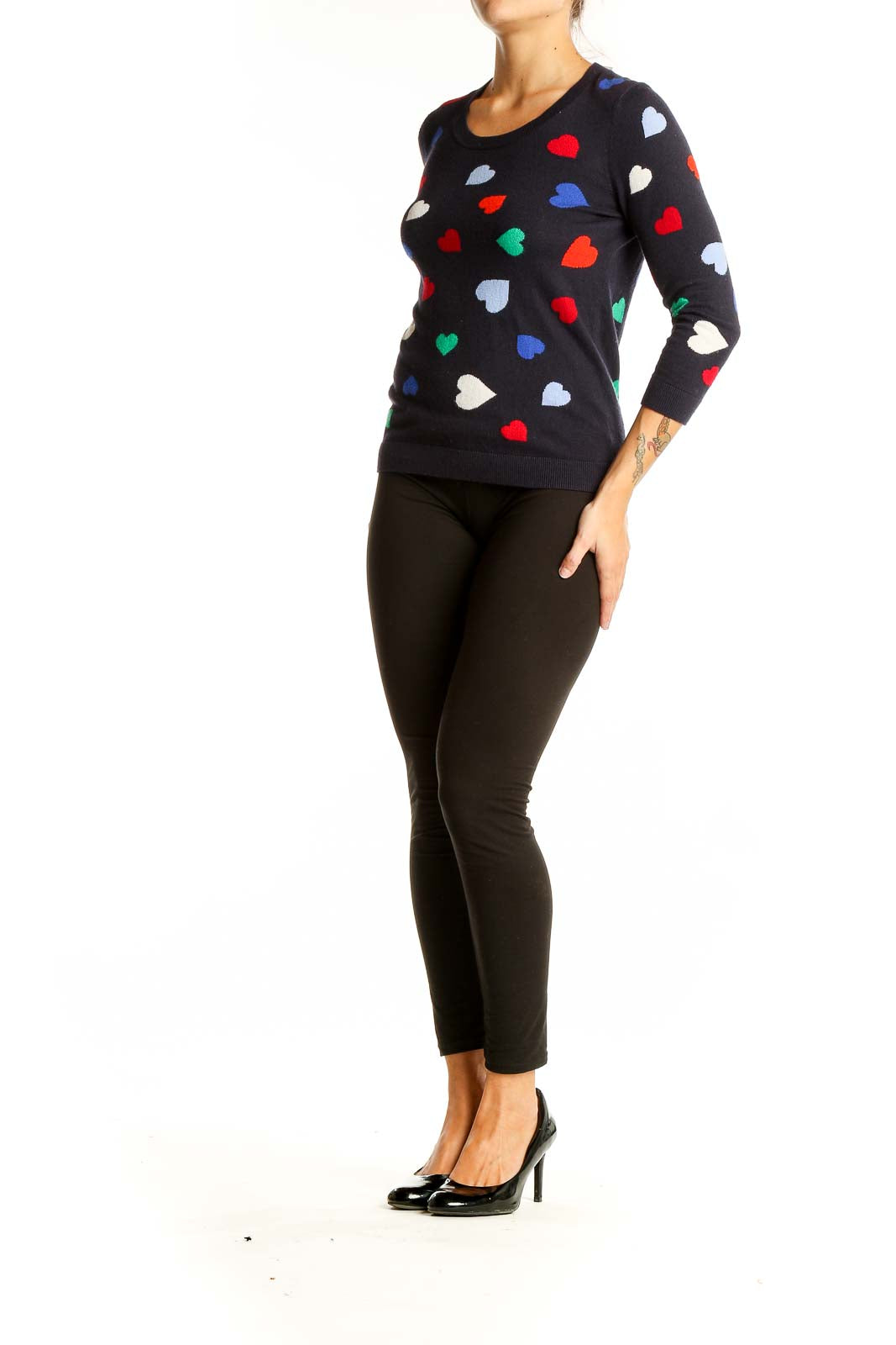 Front view of Talbots black knit sweater with multi-color heart print