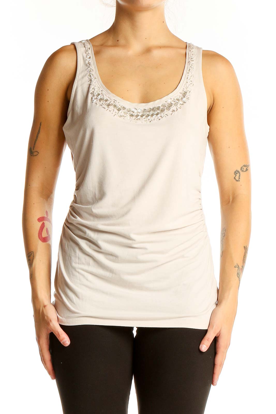 Front view of White House Black Market beige embellished sleeveless tank top