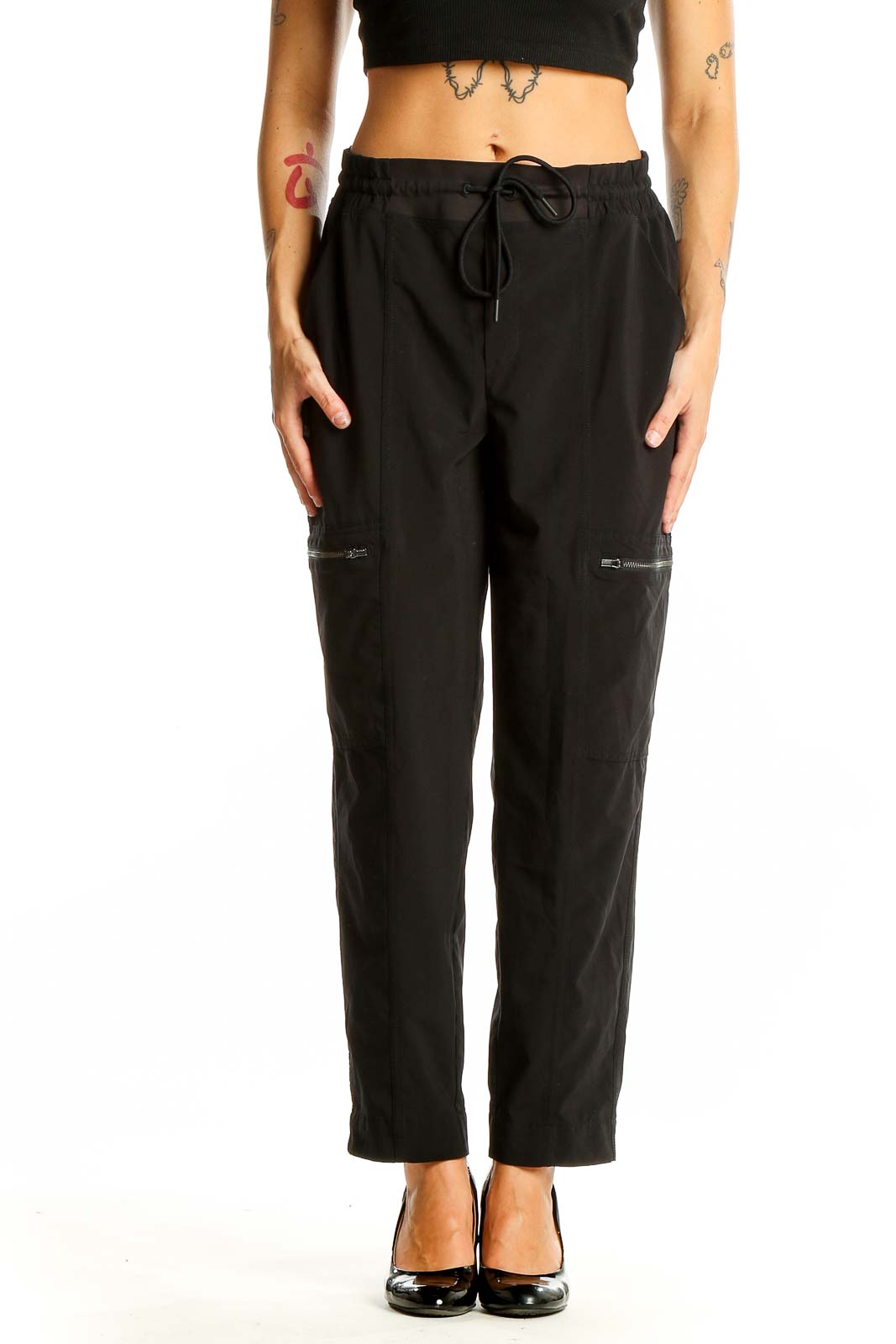 Front view of black Athleta athletic pants with drawstring waist