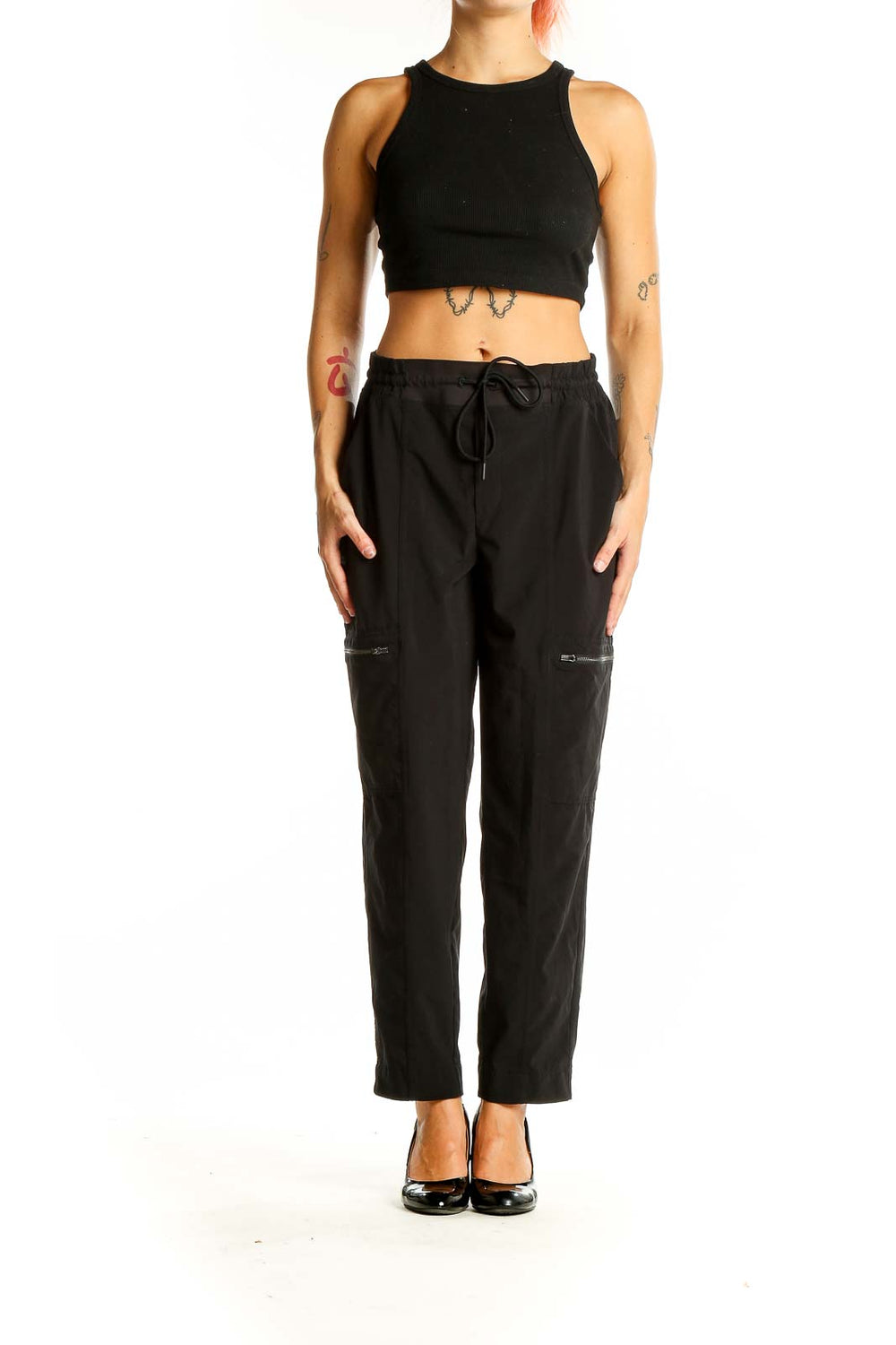 Front view of black Athleta athletic pants with drawstring waist