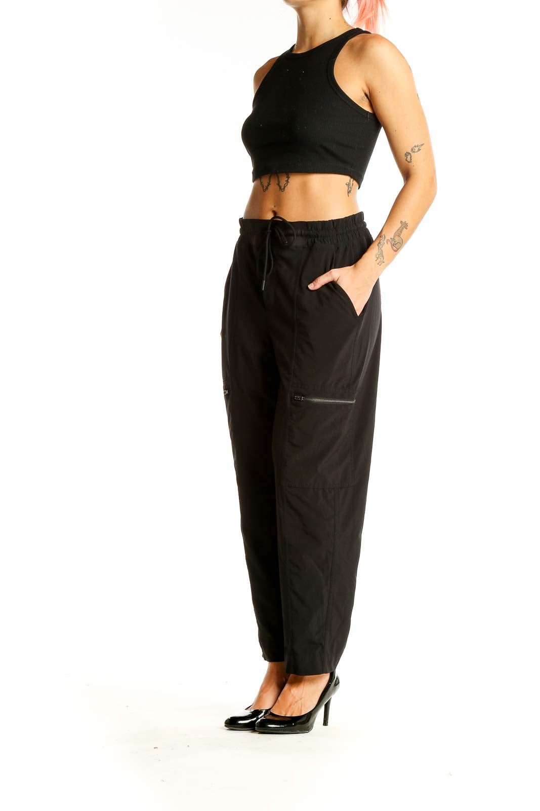 Front view of black Athleta athletic pants with drawstring waist