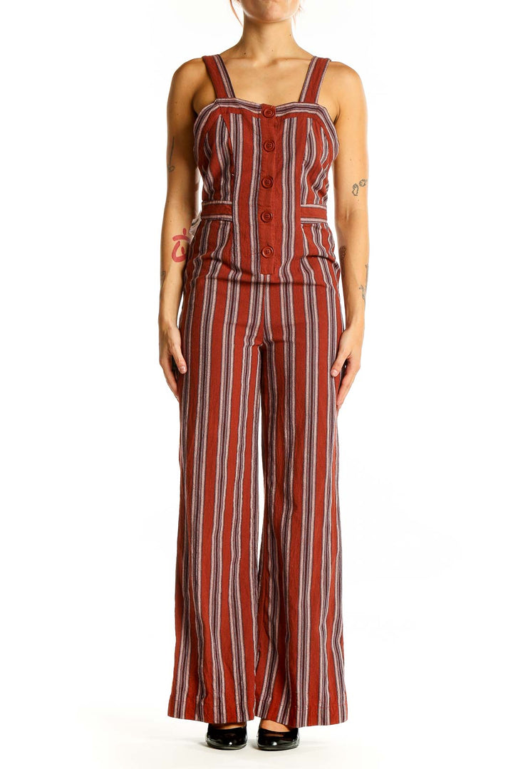 Front view of Audrey 3+1 rust striped linen-rayon jumpsuit with button-front design