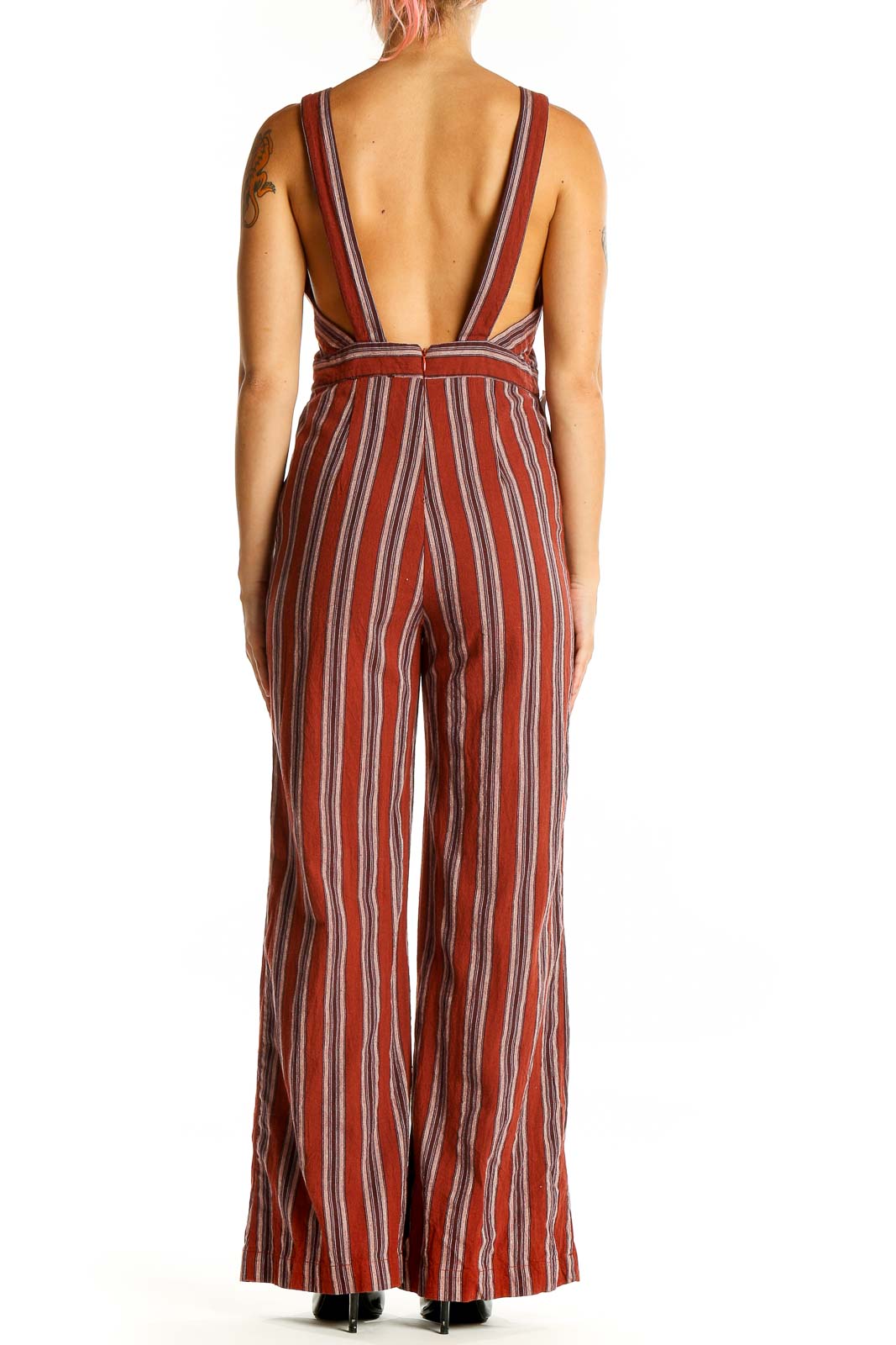 Side view of Audrey 3+1 rust striped linen-rayon jumpsuit showing wide-leg pants