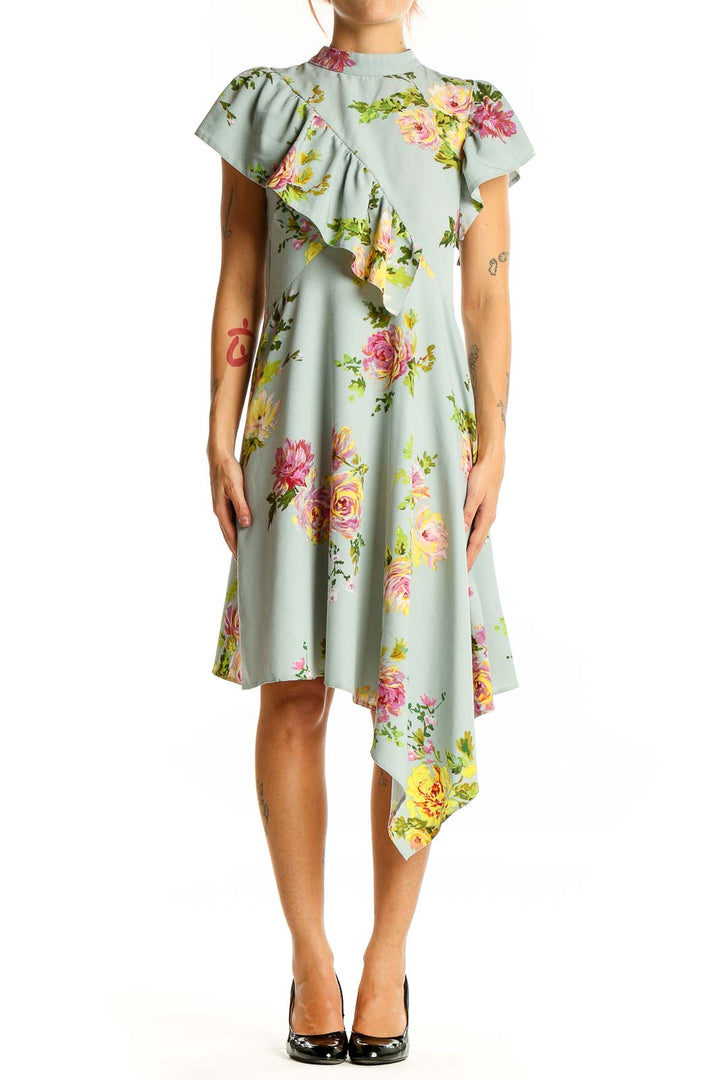 Front view of ASOS mint floral dress with ruffled overlay and asymmetric hemline