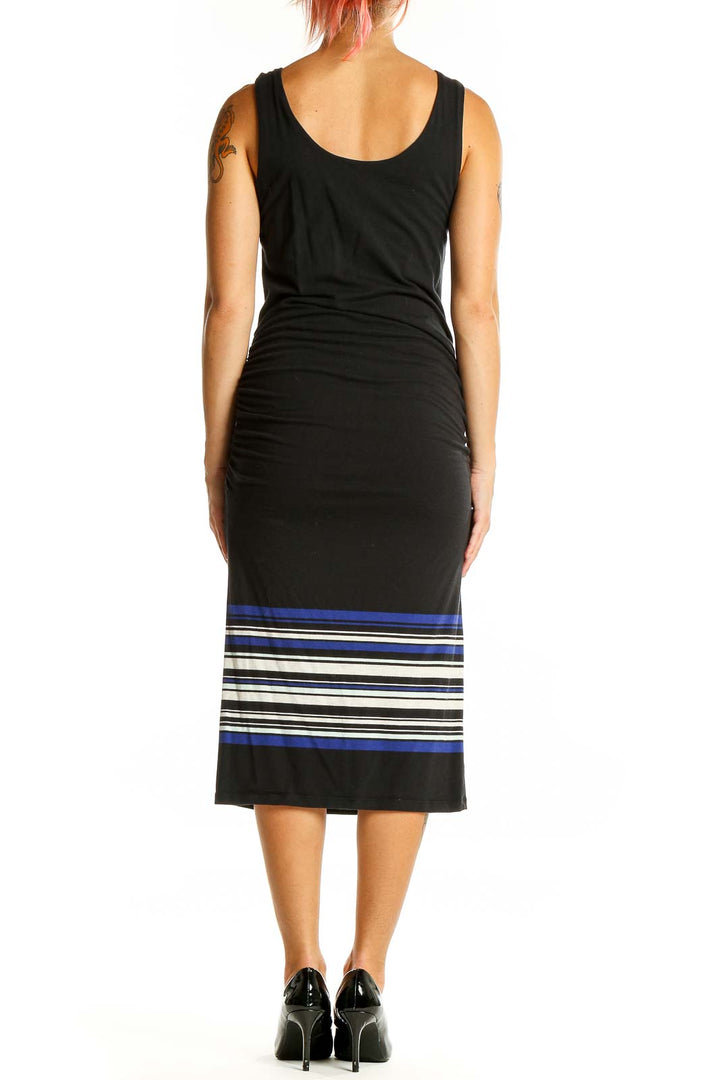 Back view of Athleta Black Striped Midi Dress showing striped hem