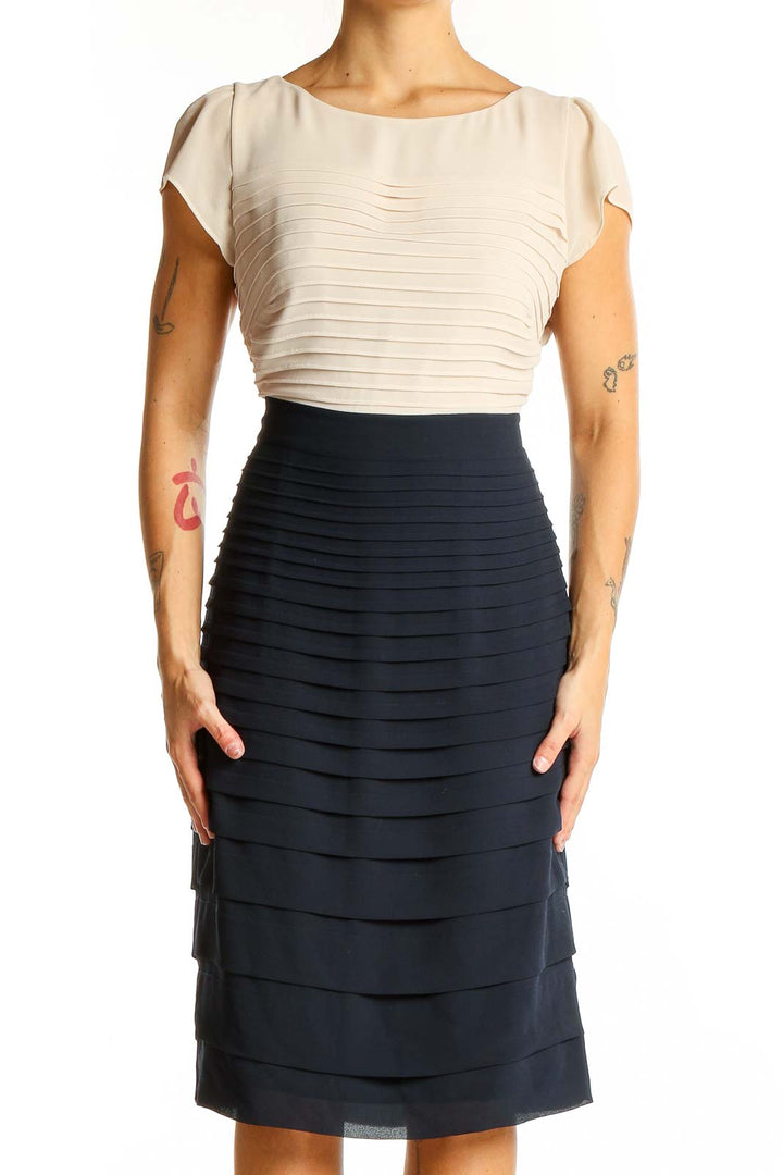 Front view of Autograph cream and navy tiered midi dress