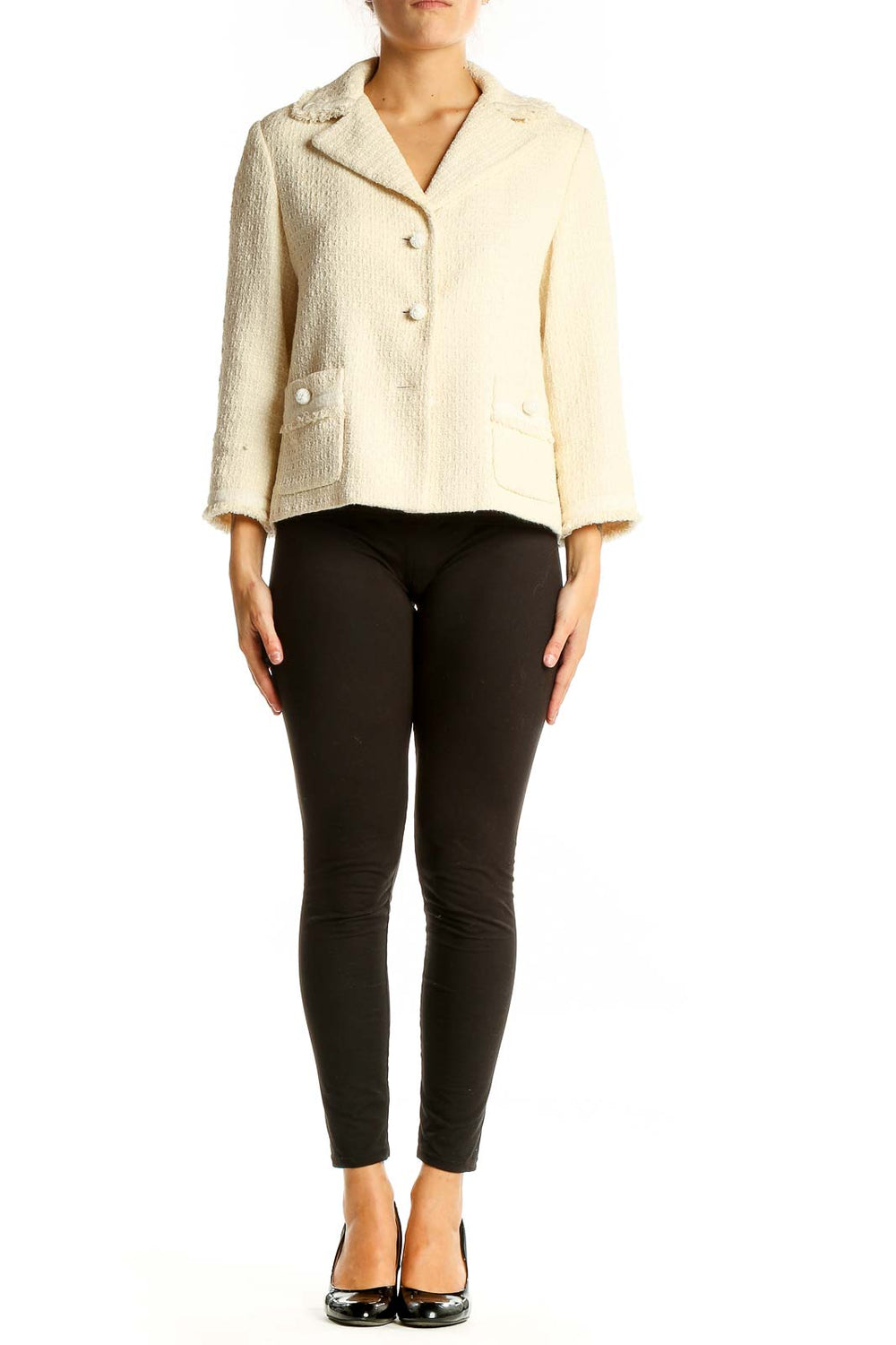 Front view of cream textured Ann Taylor blazer with notched collar and patch pockets