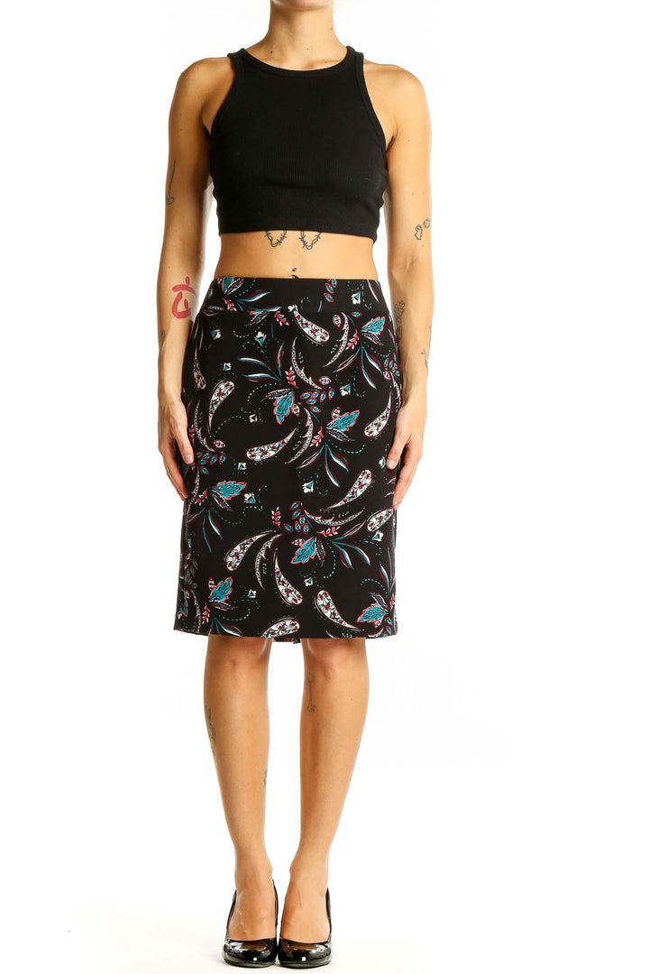 Front view of Ann Taylor black pencil skirt with colorful floral print