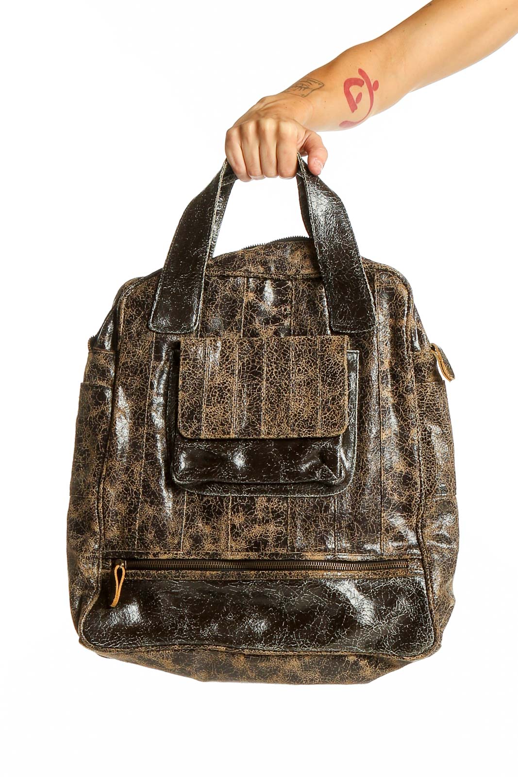 Front view of Bryna Nicole brown distressed leather satchel with top handles