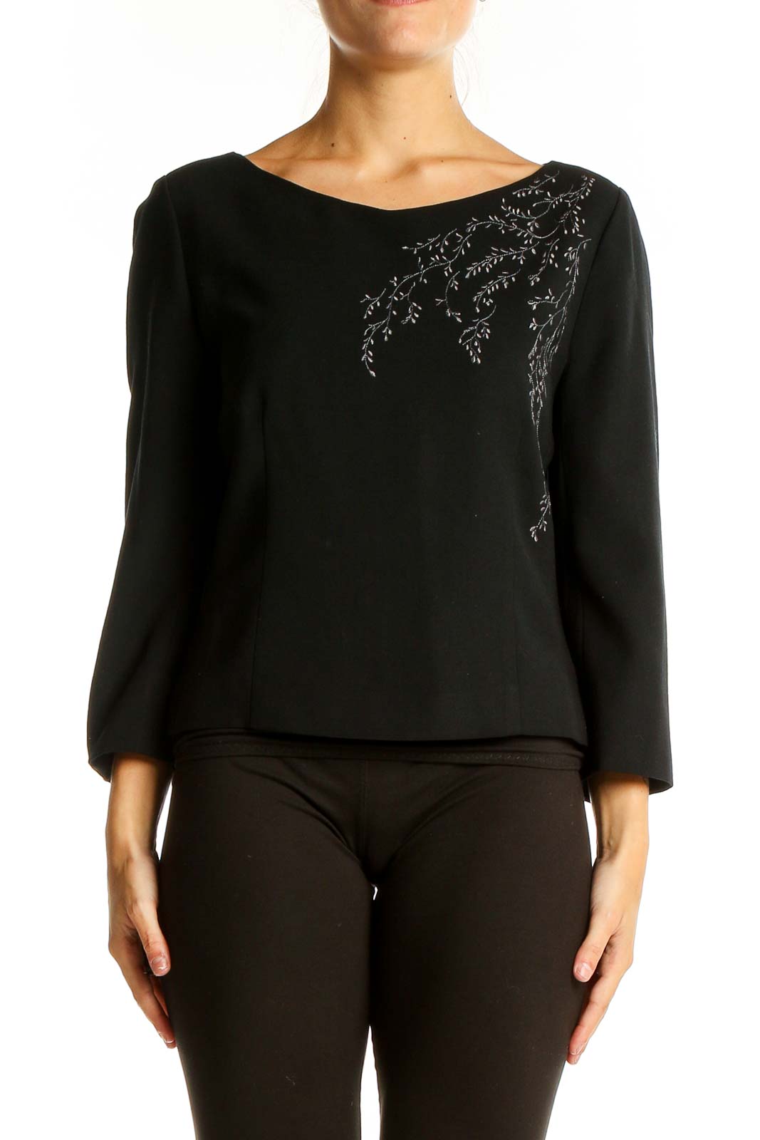 Front view of black LOFT top with embroidered neckline