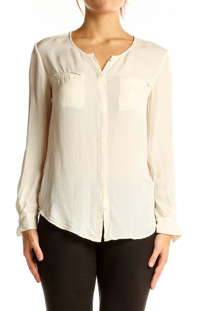 Front view of Joie ivory silk long-sleeve blouse with V-neckline