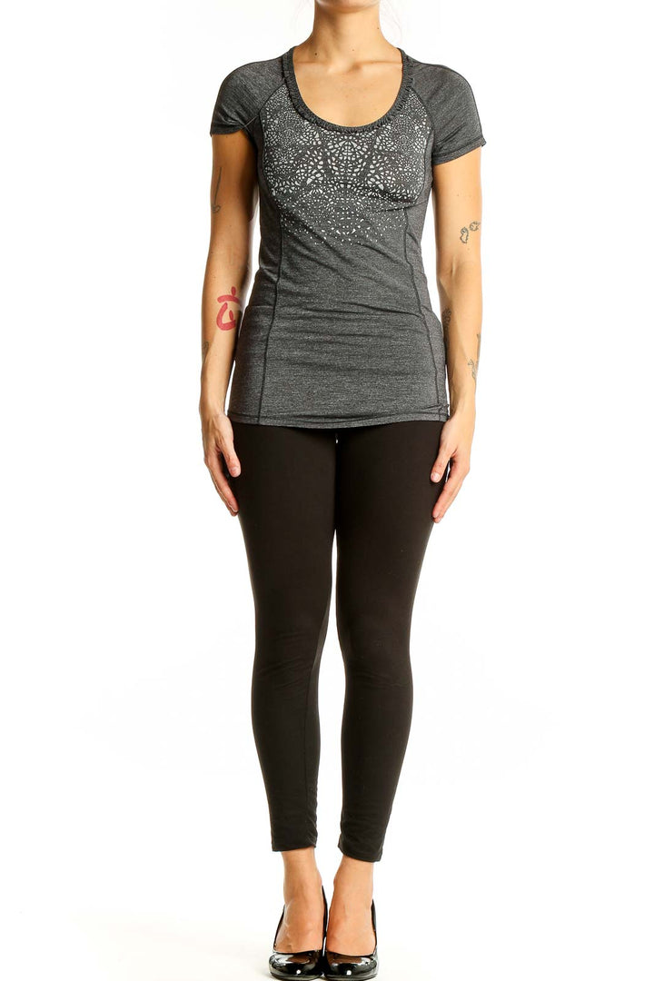 Front view of gray Lululemon performance top with patterned design