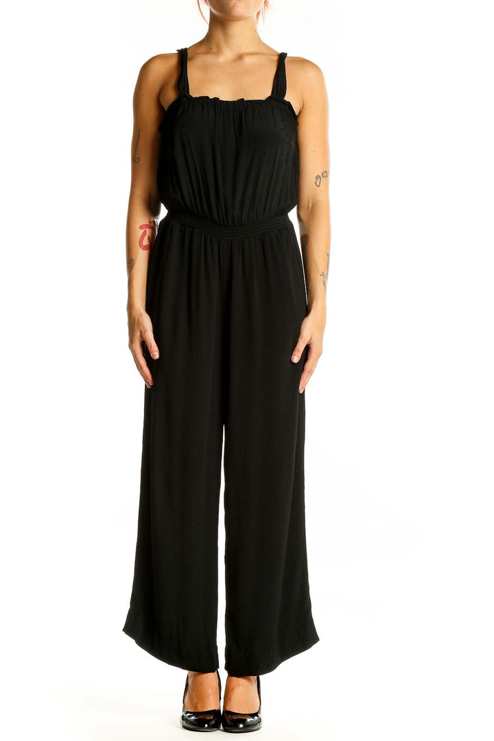 Front view of black Madewell wide-leg jumpsuit on model