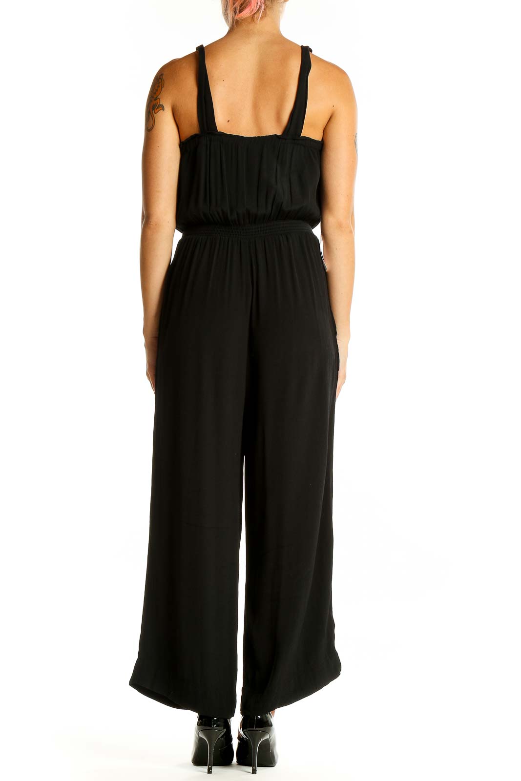 Back view of black Madewell wide-leg jumpsuit on model