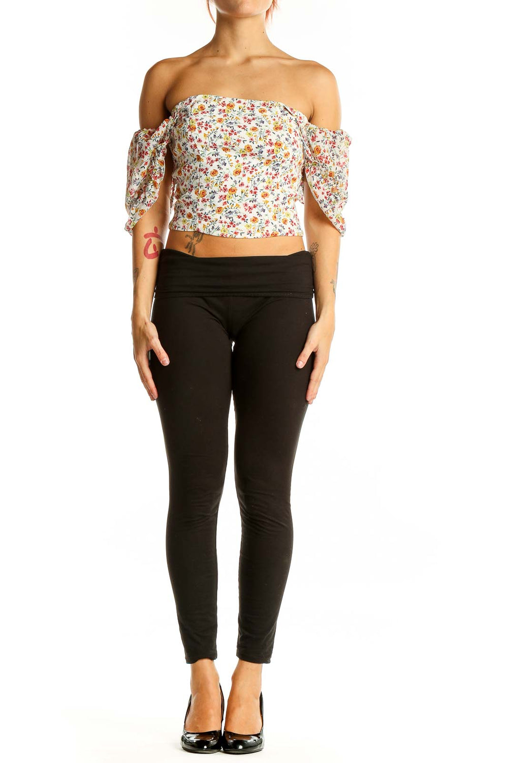 Front view of Flynn Skye floral off-shoulder crop top with puffed sleeves