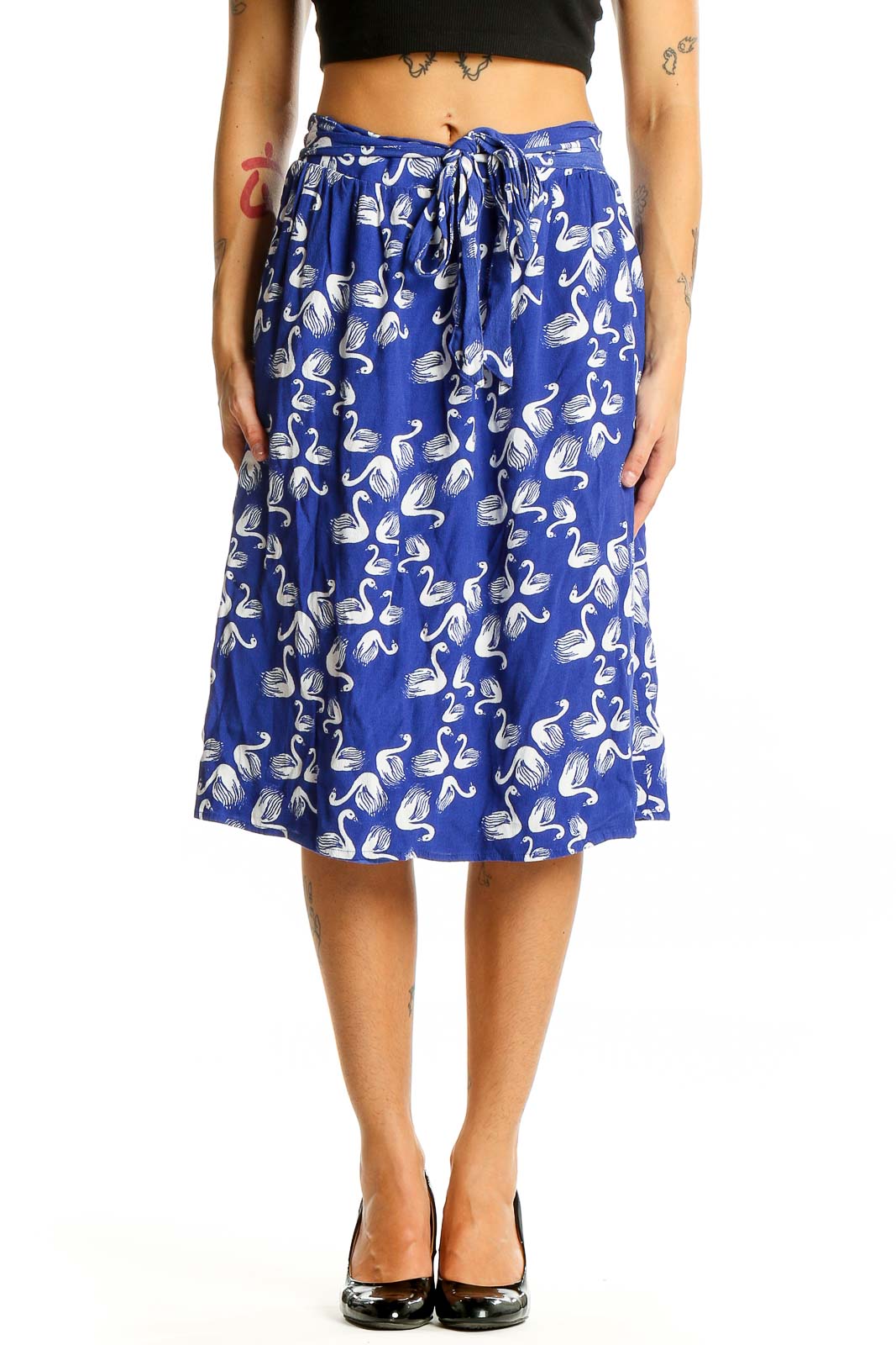 Front view of blue midi skirt with white swan print and elastic waistband