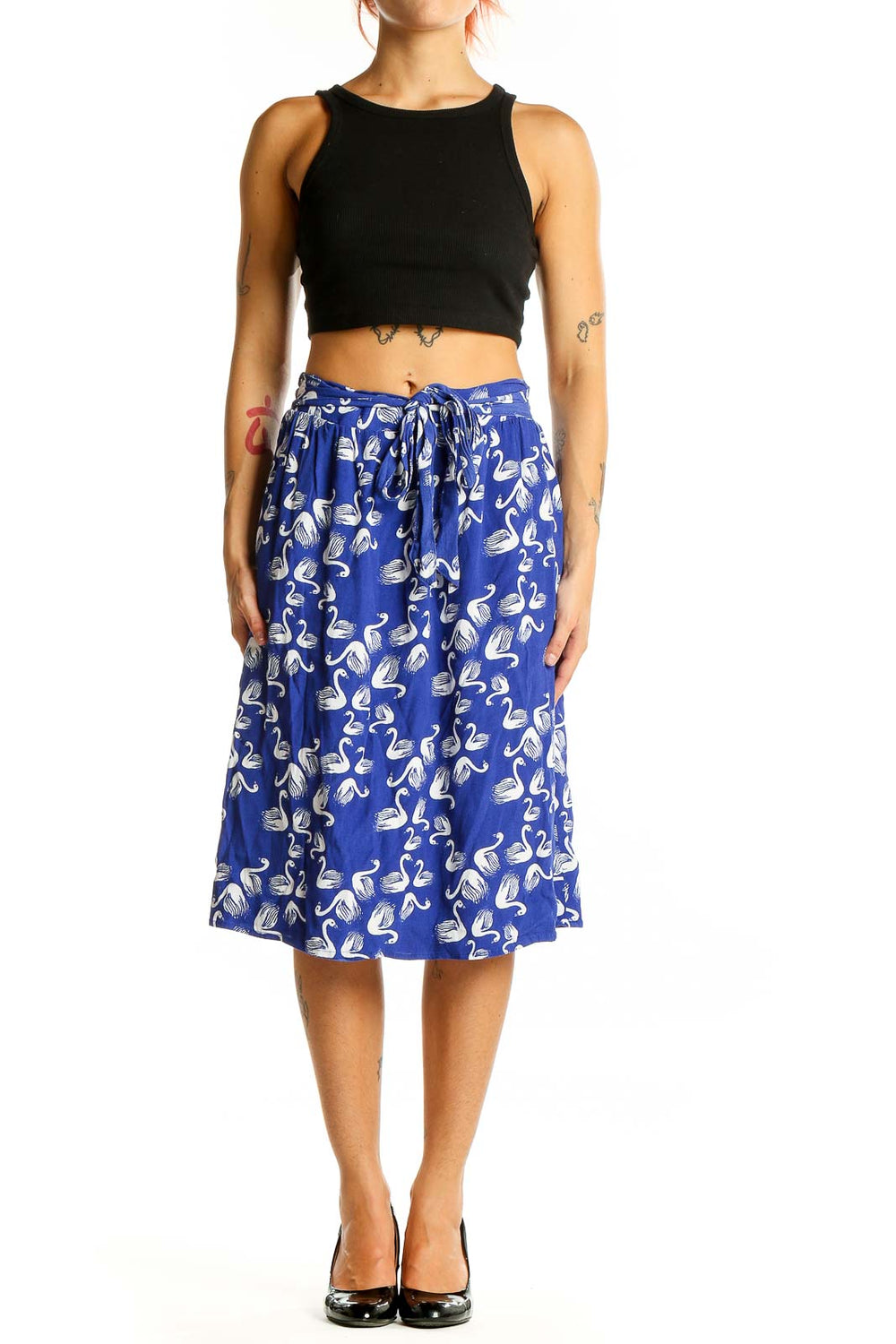 Front view of blue midi skirt with white swan print and elastic waistband