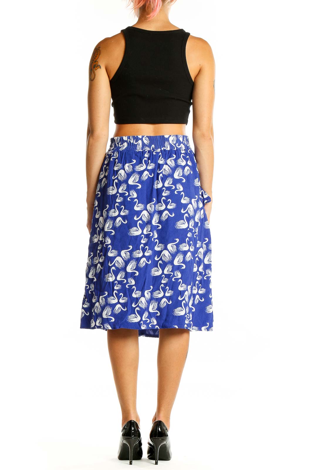 Back view of blue midi skirt with white swan print showing full length