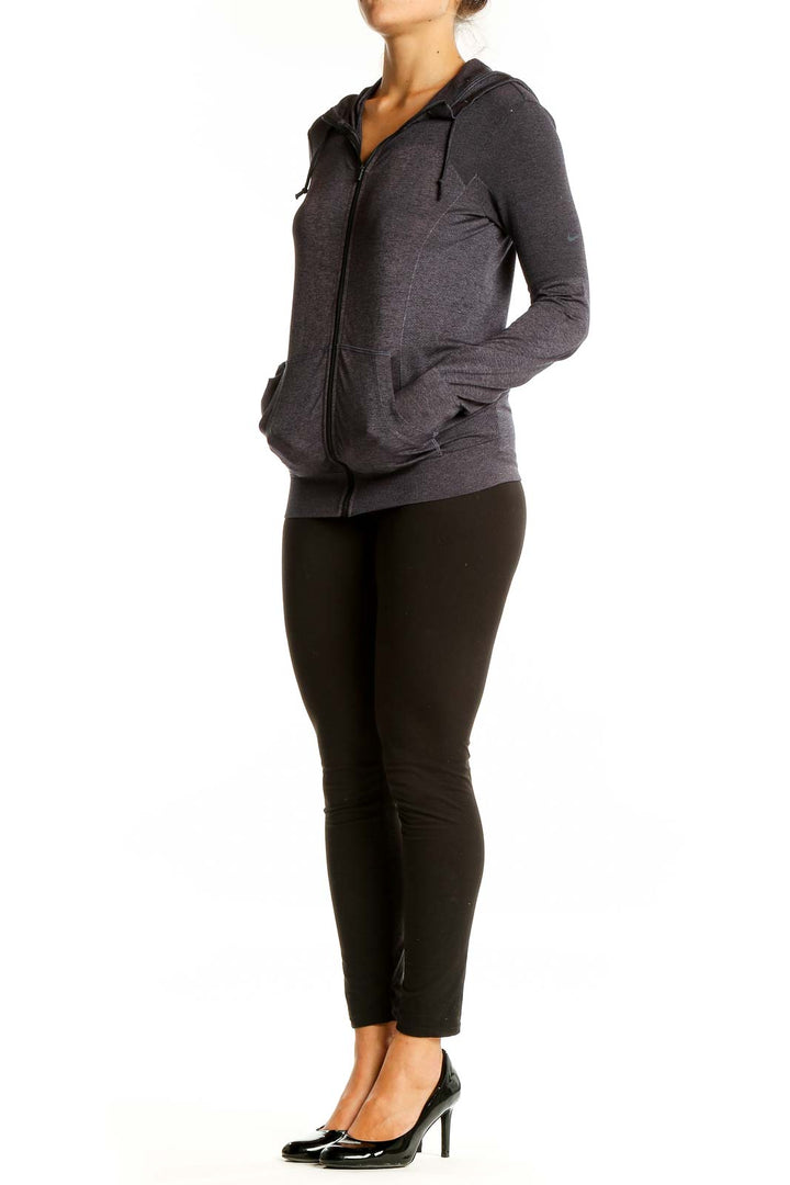 Front view of charcoal gray Nike zip-up activewear hoodie