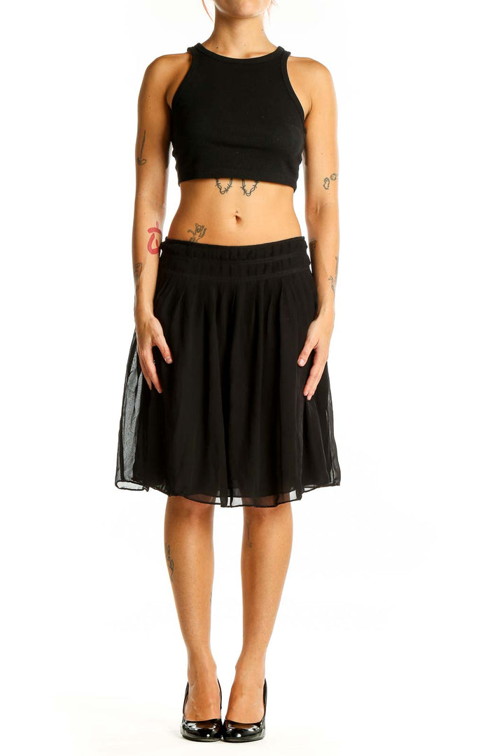 Front view of Max Studio black pleated chiffon knee-length skirt