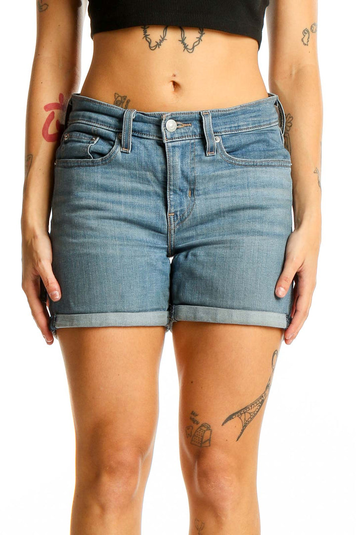 Front view of light blue Levi's denim shorts with cuffed hem